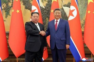 金正恩総書記、対韓国で外交攻勢　習近平主席に統一放棄理解求める