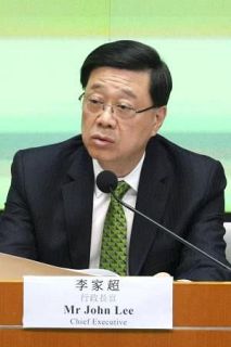 香港、中国人労働者の規制強化　愛国教育も推進