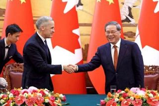 中国とカナダの首相、北京で会談　関係改善で貿易拡大図る
