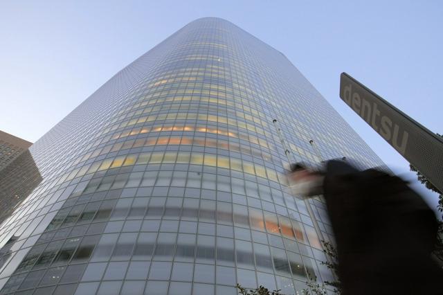 電通グループ新社長に佐野氏、海外不振で損失3千億円超